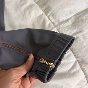 Zyia joggers with zipper at the ankle.  Gray, size 4.  Never worn.